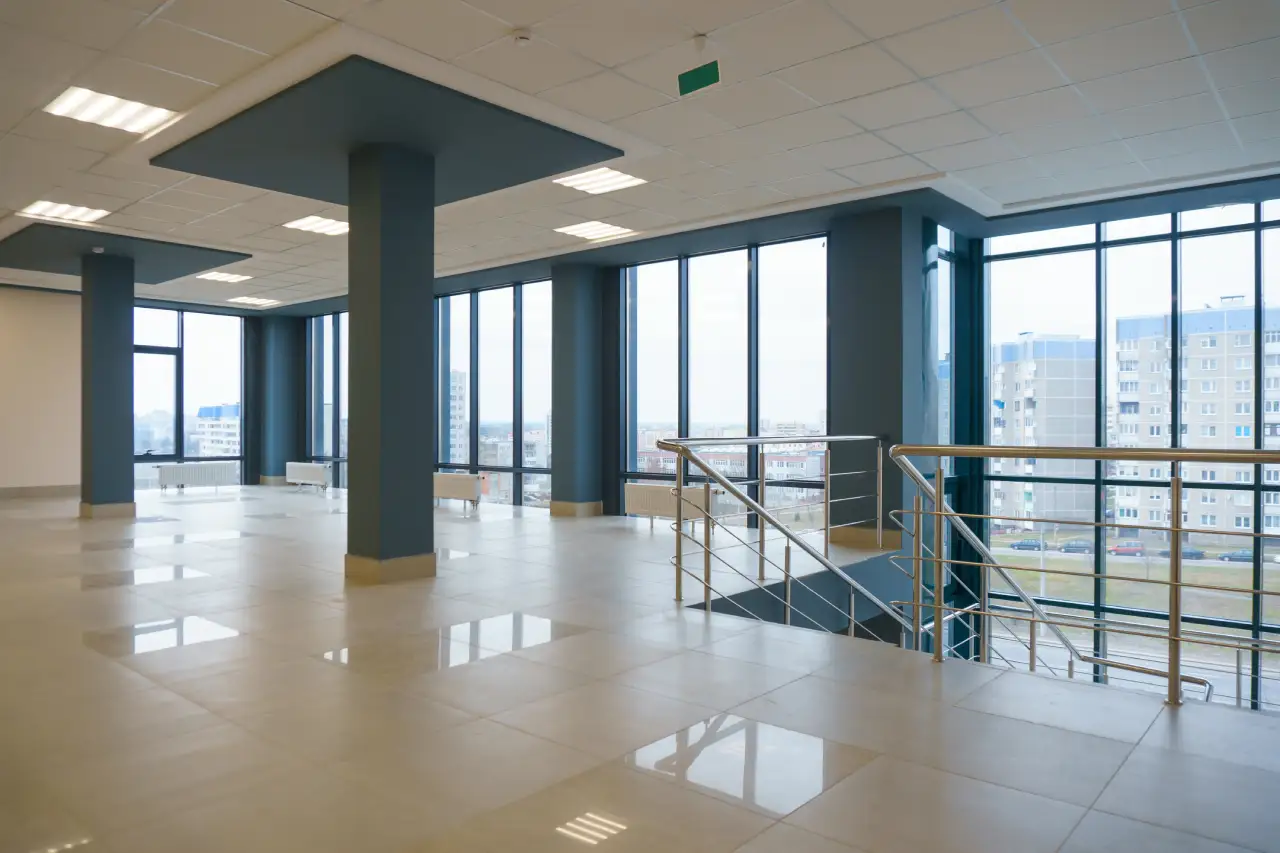 view-empty-spacious-hall-with-large-panoramic-windows-modern-interior-design-empty-office-room-with-large-windows